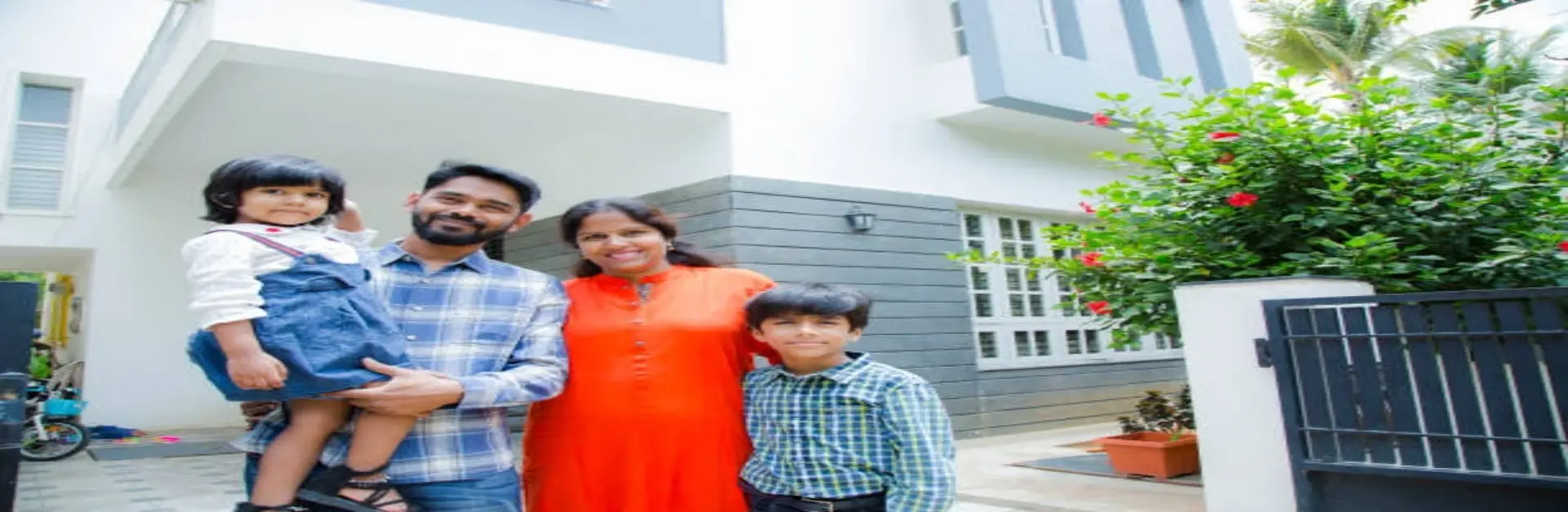 Family of four in their home