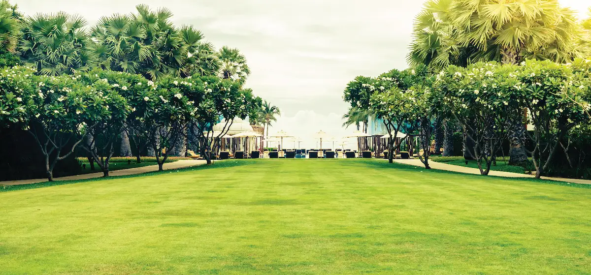 Landscaped garden and lawn at Godrej Majesty, a wide official project visual